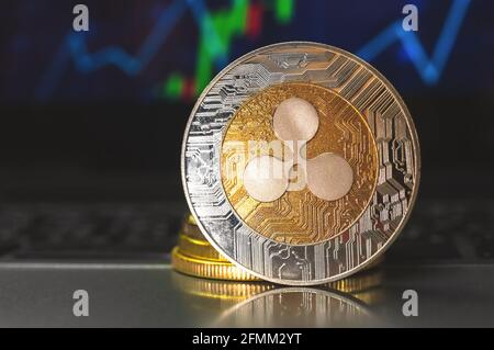 Ripple coin business and finance background with stock chart graphs close up Stock Photo