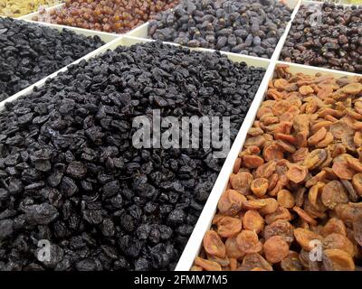 Various dried fruits For Sale At Market close up. Healthy foods. Stock Photo
