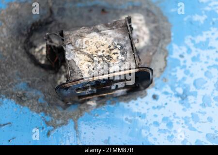 Toaster after fire. Household electrical appliance fire hazard. Overload. Short circuit. Carelessness. Safety in home. Danger home inflammation Insura Stock Photo