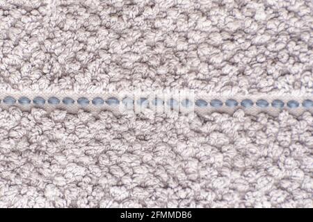 Abstract gray background. Rough texture. Terry towel. Stock Photo