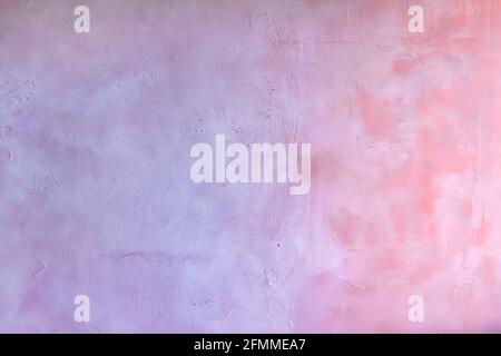 Blue and pink texture background wall with Venetian plaster. beautiful structure of a cement wall. Textures of construction plasters. Background. Copi