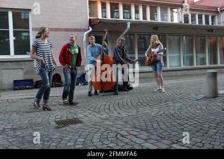 buskers, street group making music Stock Photo