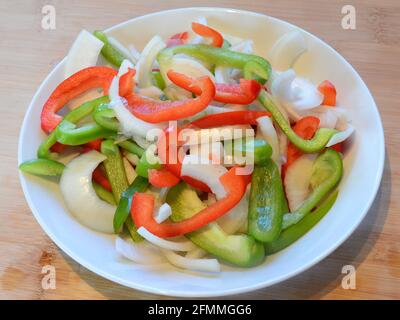 sweet peppers and onion, mediterranean cuisine. cooking ingredients and salad Sid order recipe Stock Photo