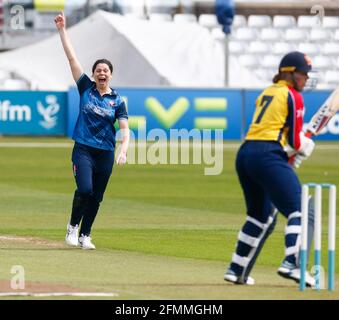 CHELMSFORD, United Kingdom, MAY 09: Alice Davidson-Richards of Kent Women   celebrates the wicket of Essex Women's Kelly Castle  during WomenÕs County Stock Photo