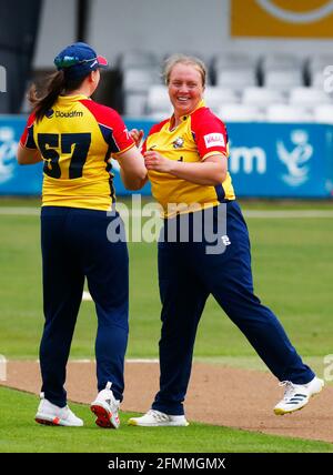 CHELMSFORD, United Kingdom, MAY 09: Essex Women's Katie Midwood celebrates LBW on Grace Gibbs of Kent Women with Essex Women's Catherine Dalton  durin Stock Photo