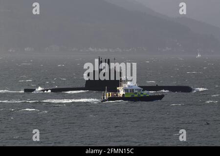 KNM Uredd (S305), an Ula-class submarine operated by the Royal Norwegian Navy, passing Gourock on the Firth of Clyde to participate in the military exercise Strike Warrior and Joint Warrior 21-1. She is seen here being escorted by the Ministry of Defence Police boat MDP Skye. Stock Photo