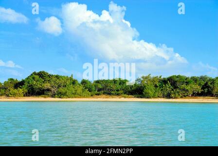 A beautiful small island off the Coast of Belize on a sunny day. Stock Photo