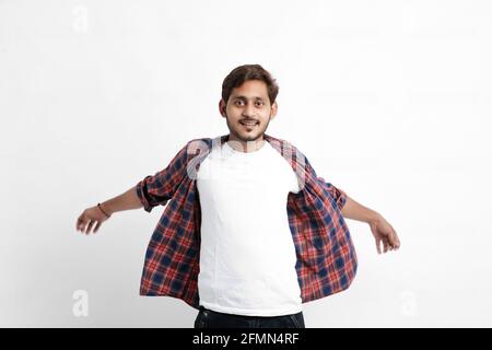 Indian or Asian man giving multi pal expression over white background Stock Photo