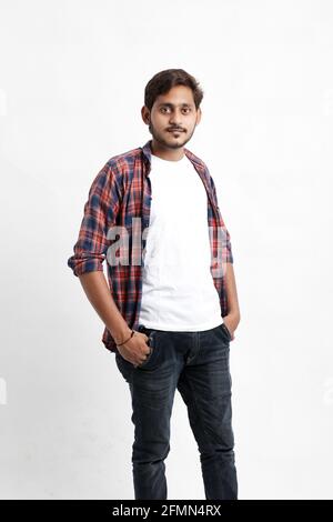 Indian or Asian man giving multi pal expression over white background Stock Photo