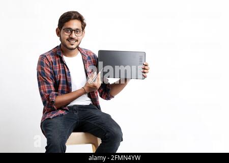 Young indian Professional designer showing graphic tablet with digital pen. Stock Photo