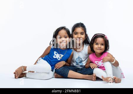 Indian Kids,portrait of three Indian girl kids ,isolated on white background. Stock Photo