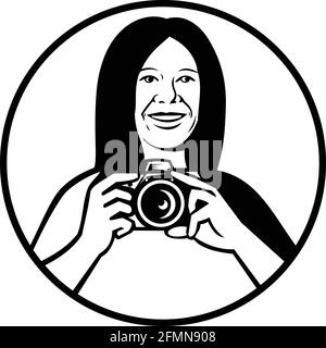 Mascot illustration of a female photographer holding a DSLR camera smiling viewed from front set inside circle on isolated background in black and whi Stock Vector