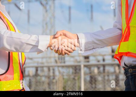 Close up Hand shake teamwork, Engineer shake hand teamwork Stock Photo