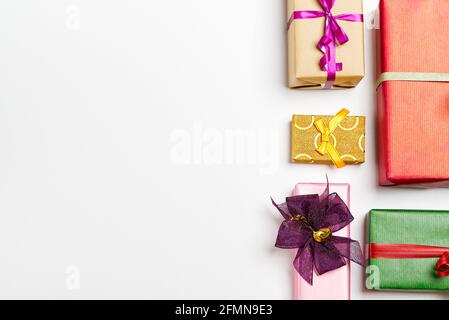Christmas gift boxes collection on white table. gift boxes Flat lay Stock Photo