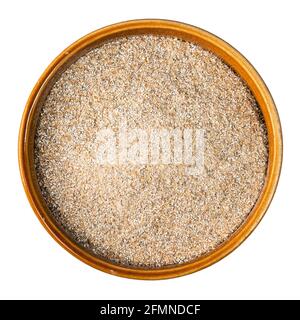 top view of rye bran in round ceramic bowl cutout on white background Stock Photo