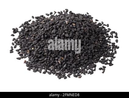 pile of Nigella sativa seeds (black caraway) closeup on white background Stock Photo