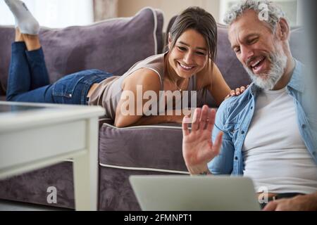 Joyful mature male person having video call Stock Photo