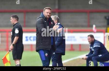 Bolton manager Ian Evatt applauds his players during the Sky Bet League Two match between Crawley Town and Bolton Wanderers at the People's Pension Stadium  , Crawley ,  UK - 8th May 2021 Stock Photo