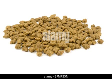 Heap of dry food for cats and dogs on a white background, isolate Stock Photo