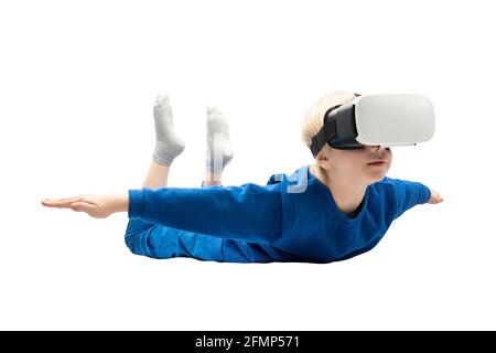 Boy flies in virtual reality glasses isolated on white background. 3d video games concept Stock Photo