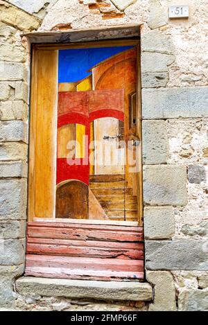An old painted entrance door Stock Photo