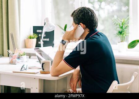 The young man working from home Stock Photo