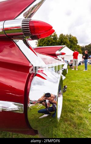 isolated view red bullet rear lights of vintage 1959 Cadillac Coupe de Ville at Stars & Stripes American Classic car show Stock Photo