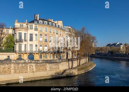 Paris, France - April 13, 2021: View of ile saint-louis and quai Henri IV, typical facades and quays in Paris Stock Photo