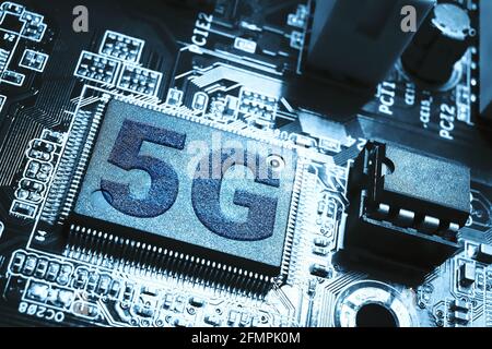 Close up view of central computer processor CPU blank microchip 5G. Motherboard circuit background. Stock Photo