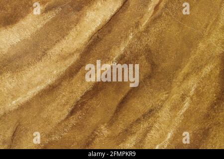 Beige artificial marble texture. Stone abstract background pattern, painted on the wall. Stock Photo