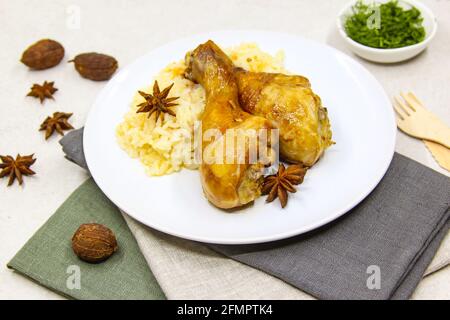 Appetizer chicken biryani in plate on white background. Traditional Indian food. Stock Photo