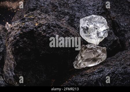 rough diamond, crystal in an allotropic form of carbon, uncut gemstone, concept of luxury or wealth Stock Photo