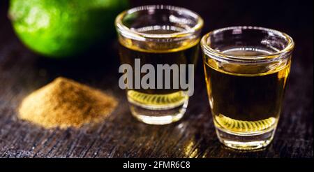 Mezcal glasses tequila variation with pepper salt and earthworm