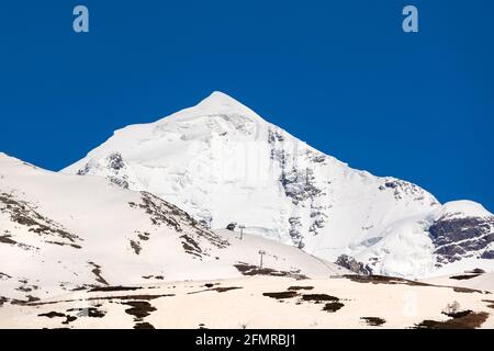 Mount Tetnuldi rises above the Great Caucasian Range in the upper Svaneti. Georgia Stock Photo