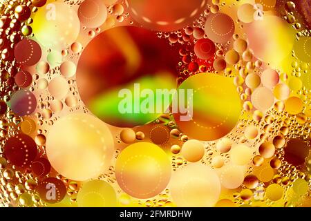 Multicolored abstract background with round bubbles on the water surface.Makeup concept,good as digital decor or wallpapers. Stock Photo