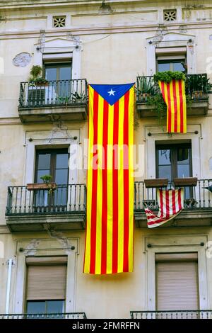 Catalan flags placed on balconies, Something done the day of National Day of Catalonia Stock Photo