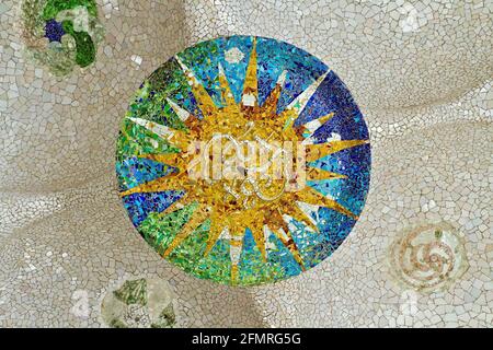 Ceiling with mosaic sun at Guell Park, Barcelona, Spain. Stock Photo