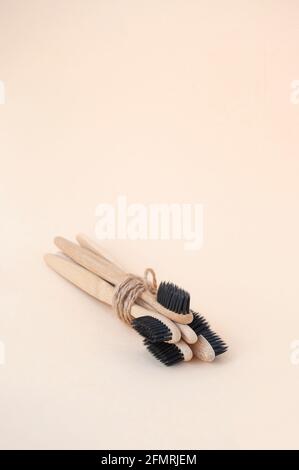 Zero waste concept. Eco-friendly toothbrushes on light beige background with copy space. Stock Photo