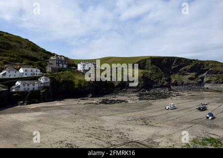 Port Issac Harbour with houses and boats north Cornwall England UK Stock Photo