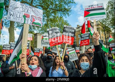 London, UK. 11th May, 2021. A pro Palestine demonstration in Whitehall opposite Downing Street, opposing Israel's latest plans to move Palestinian residents of Jerusalem. Credit: Guy Bell/Alamy Live News Stock Photo