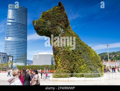 BILBAO, SPAIN - MAY 01: The giant floral sculpture 'Puppy' on May  01, 2012 in Bilbao, Spain. The dog is a work of Jeff Koons placed at the doors of T Stock Photo