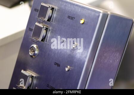 Stainless steel control box close up. Selective focus. Stock Photo