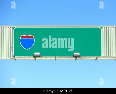 American interstate highway overhead road sign. Blue sky background Stock Photo