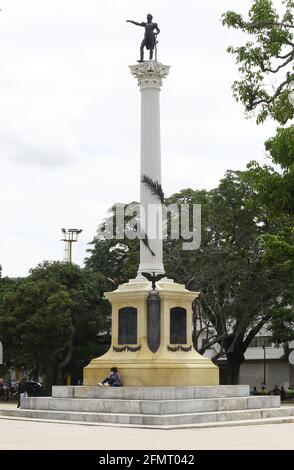Valencia, Carabobo, Venezuela. 11th May, 2021. May 11, 2021. A young woman waits seated in the Bolivar square in the city of Valencia, Carabobo state. Photo: Juan Carlos Hernandez Credit: Juan Carlos Hernandez/ZUMA Wire/Alamy Live News Stock Photo