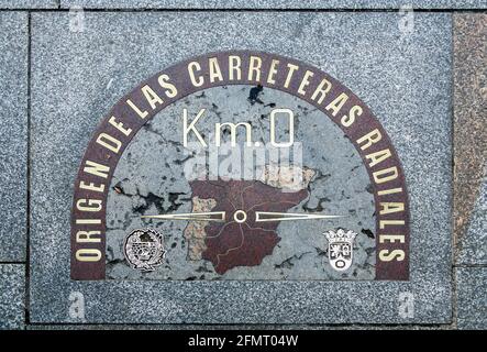 Madrid Kilometre Zero Km 0 stone indicating the geographical center of  Spain from which all six national roads are measured Stock Photo - Alamy