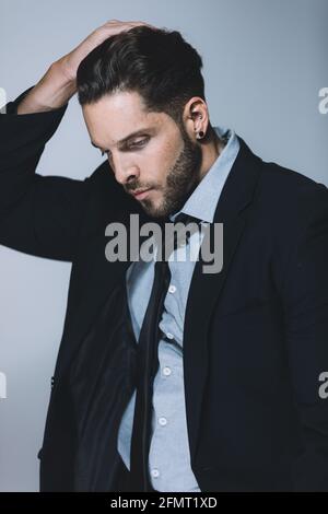 Handsome man posing in a studio Stock Photo