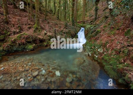 Small waterfall on the Rio de la Fraga in Galicia, Spain. Stock Photo