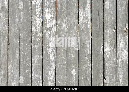 Wood texture creating a nice abstract surface with old white scratched paint. Stock Photo
