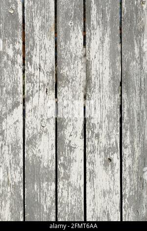 Wood texture creating a nice abstract surface with old white scratched paint. Stock Photo