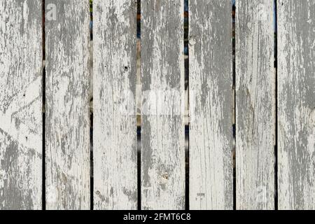 Wood texture creating a nice abstract surface with old white scratched paint. Stock Photo